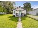 Charming single-story home featuring a quaint front porch and a well-manicured lawn at 2631 Collier St, Indianapolis, IN 46241