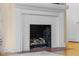 Classic white fireplace with a brick hearth and decorative mantle at 2645 Washington St, Columbus, IN 47201