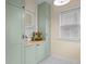 Charming kitchen featuring light green cabinetry and butcher block countertops at 2645 Washington St, Columbus, IN 47201