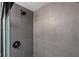 Modern shower with gray subway tile, black fixtures, and sleek design at 2645 Washington St, Columbus, IN 47201