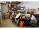Unfinished basement with shelving units and various stored items, offering ample storage solutions at 2780 W Grizzly Trl, Martinsville, IN 46151