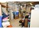 Unfinished basement featuring concrete walls and floor, water heater, and plenty of storage space at 2780 W Grizzly Trl, Martinsville, IN 46151