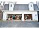 Well-lit two-car garage filled with tools and equipment; excellent storage and workspace at 2780 W Grizzly Trl, Martinsville, IN 46151