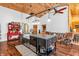 Stylish kitchen with a farmhouse sink, dark island, and plenty of storage space at 2780 W Grizzly Trl, Martinsville, IN 46151