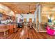 Spacious living room with wood floors, high ceilings, and a unique tree-like design feature at 2780 W Grizzly Trl, Martinsville, IN 46151