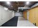 Unfinished basement with exposed ceiling and painted walls at 2905 N Warman Ave, Indianapolis, IN 46222
