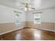 Bright bedroom with hardwood floors, ceiling fan and natural light at 2905 N Warman Ave, Indianapolis, IN 46222