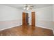 Spacious bedroom featuring hardwood floors, ceiling fan and natural light at 2905 N Warman Ave, Indianapolis, IN 46222