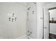 The shower stall features distinctive palm tree decals and a convenient shower caddy at 2905 N Warman Ave, Indianapolis, IN 46222