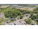 An aerial view of a neighborhood featuring charming homes, mature trees, and community amenities at 301 S Main St, Whitestown, IN 46075