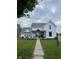 Charming cafe with a welcoming porch and well-manicured lawn at 301 S Main St, Whitestown, IN 46075