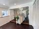 Open-concept kitchen and dining area, featuring an island, white appliances, and seamless flow to the dining space at 301 S Main St, Whitestown, IN 46075
