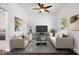 Bright living room with neutral tones, comfortable seating, and modern decor at 301 S Main St, Whitestown, IN 46075