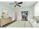 Airy bedroom showing closet, large windows, ceiling fan, and stylish decor, providing a comfortable sanctuary at 3035 N Capitol Ave, Indianapolis, IN 46208