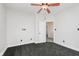 This bedroom features neutral walls, gray carpet and an open doorway that leads into the home at 3035 N Capitol Ave, Indianapolis, IN 46208