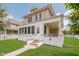 Inviting two-story home with a classic design and a welcoming front porch at 3035 N Capitol Ave, Indianapolis, IN 46208