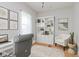 Stylish office with a desk, chair, and a bookcase at 3035 N Capitol Ave, Indianapolis, IN 46208