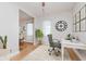 Inviting home office featuring a large desk, ergonomic chair, and ample natural light at 3035 N Capitol Ave, Indianapolis, IN 46208