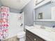 Bathroom featuring a tub/shower, vanity with sink, and modern finishes at 3223 Keystone Lakes Way, Indianapolis, IN 46237