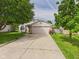 Charming home with a two-car garage, well-manicured lawn, and inviting curb appeal at 3223 Keystone Lakes Way, Indianapolis, IN 46237