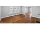 Spacious living room with ample natural light and hardwood floors, perfect for entertaining at 3227 Guilford Ave, Indianapolis, IN 46205