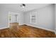Neutral Living Room with hardwood floors, fresh paint, and ample natural light at 3227 Guilford Ave, Indianapolis, IN 46205