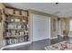 Bedroom with shelves, books, and a closet at 407 N Matthews Rd, Greenwood, IN 46143