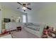 Bright bedroom with a daybed and a ceiling fan at 407 N Matthews Rd, Greenwood, IN 46143
