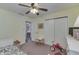 Bedroom with a ceiling fan and toys on the floor at 407 N Matthews Rd, Greenwood, IN 46143