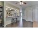 Dining area leading to kitchen and closet, highlighting the home's easy flow and storage solutions at 407 N Matthews Rd, Greenwood, IN 46143