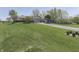 Spacious home featuring a large lawn, mature trees, and a long driveway at 407 N Matthews Rd, Greenwood, IN 46143