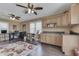 Inviting living area showcasing wood floors, built-in cabinets, and a comfortable workspace with natural light at 407 N Matthews Rd, Greenwood, IN 46143