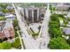 Scenic aerial view showcasing the building's architecture within its urban neighborhood, surrounded by lush greenery at 435 Virginia Ave # 101, Indianapolis, IN 46203