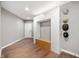 Stylish entryway with custom storage solutions and wood grain floors at 435 Virginia Ave # 101, Indianapolis, IN 46203