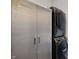 Laundry room with washer, dryer, utility sink, and cabinet for convenient home maintenance at 435 Virginia Ave # 101, Indianapolis, IN 46203