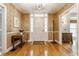 Inviting foyer with hardwood floors, chandelier, and traditional decor at 5165 E Pleasant Run Pkwy S Dr, Indianapolis, IN 46219