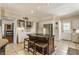 Bright kitchen featuring an island with seating, stainless steel appliances, and ample storage at 5165 E Pleasant Run Pkwy S Dr, Indianapolis, IN 46219