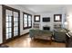 Spacious living room boasting hardwood floors, a decorative fireplace, and ample seating at 5259 Broadway St, Indianapolis, IN 46220