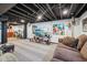 Finished basement with painted ceilings, cozy seating, and entertainment setup at 5333 Ralston Ave, Indianapolis, IN 46220