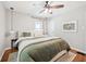 Bedroom offering a ceiling fan, hardwood floors, and a neutral color palette at 5333 Ralston Ave, Indianapolis, IN 46220