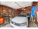 Spacious garage with wood paneling, room for a car and storage at 5333 Ralston Ave, Indianapolis, IN 46220
