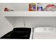 The laundry space features modern washer and dryer units at 5369 Red River Ct, Indianapolis, IN 46221