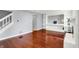 Bright living room features hardwood floors, fresh paint, and decorative fireplace at 5369 Red River Ct, Indianapolis, IN 46221
