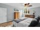 Bedroom with a ceiling fan and views from the large window overlooking the exterior at 5419 Cayman Dr, Carmel, IN 46033