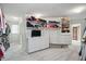 Large walk-in closet with custom shelving, storage, and a television at 5419 Cayman Dr, Carmel, IN 46033