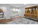 Charming kitchenette features bright cabinetry, wooden floors, and decorative hutch at 5419 Cayman Dr, Carmel, IN 46033