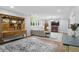 Finished basement boasts a living room with fireplace, hardwood flooring, and ample natural light at 5419 Cayman Dr, Carmel, IN 46033