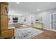 Open living room offers wood flooring, neutral paint, fireplace, and a cozy sitting area at 5419 Cayman Dr, Carmel, IN 46033