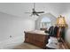 Bright, airy main bedroom with a fan, arched window and a nice view at 5419 Cayman Dr, Carmel, IN 46033
