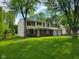 Charming two-story home featuring an attached two-car garage and a well-maintained lawn at 5515 Lunsford Dr, Indianapolis, IN 46237